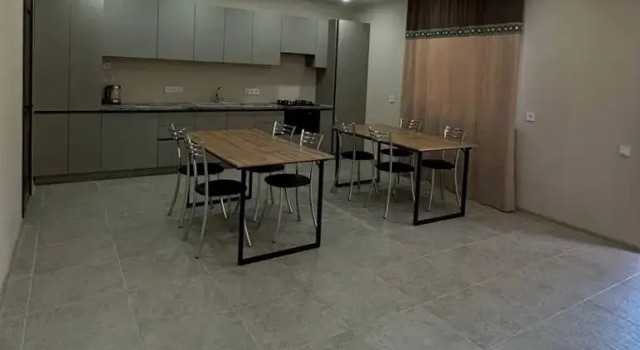 Кровать в общем номере Гостевой дом Хвоя