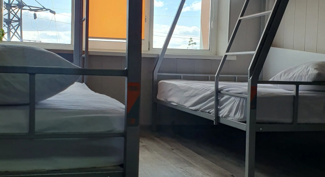 Łóżko w pokoju wieloosobowym Pyatyj Element Hotel