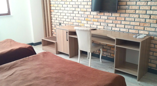 Четырёхместный номер Deluxe Отель Metinoğlu Pansiyon (Chalet Khione) Sarıkamış