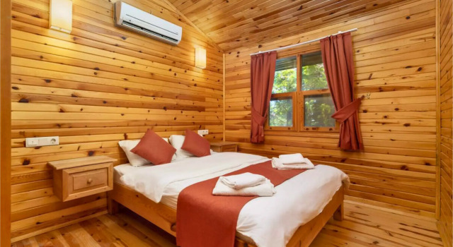 Бунгало с 2 комнатами с балконом и с видом на сад Отель Izgen Bungalows