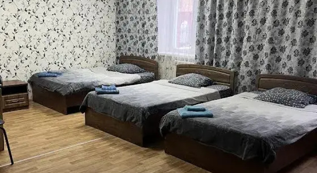 Кровать в общем номере Гостевой дом ТвойОтель