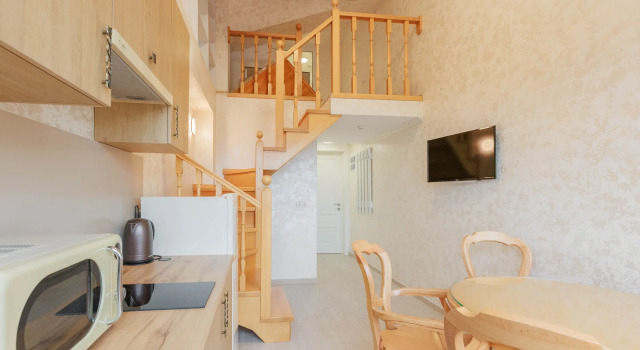 Четырёхместный номер Улучшенный двухуровневый с видом на город Апарт-отель Мелодия моря