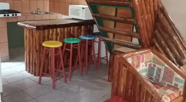 Четырёхместный коттедж с красивым видом из окна Отель Cabañas Rústicas el Benny Rotamundos