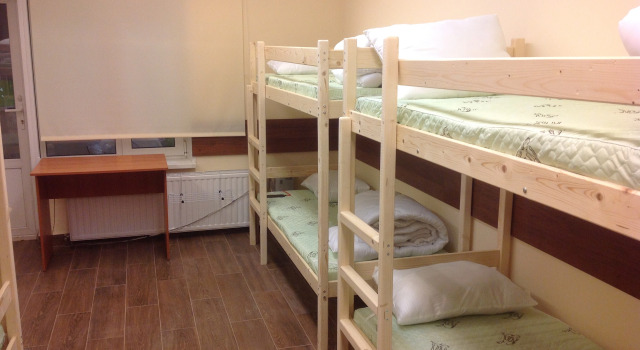 Postel ve společném pokoji pro muže MKS Group Hostel