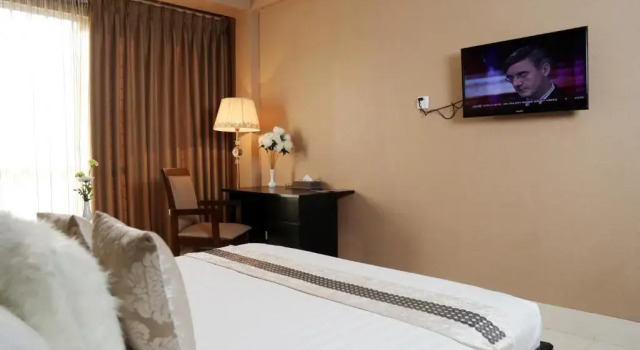 Executivo quarto Civic Inn