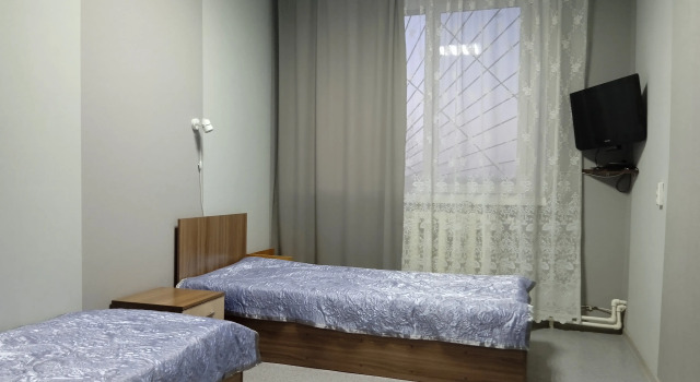 Кровать в общем номере Хостел ОптиМал