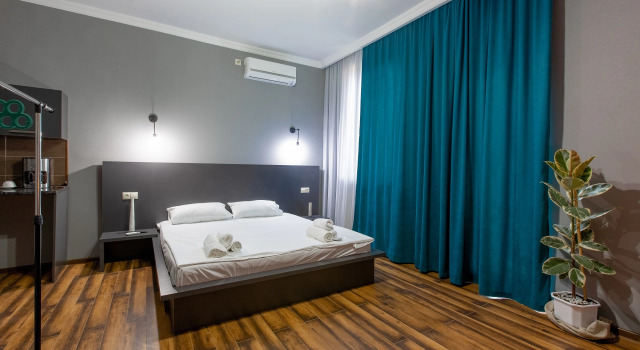 Студия с балконом и с красивым видом из окна 4 Rooms