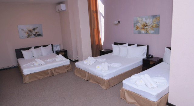 Четырёхместный номер Superior Richmind Hotel