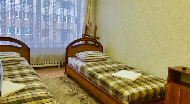 Кровать в общем номере Гостиница Юбилейная