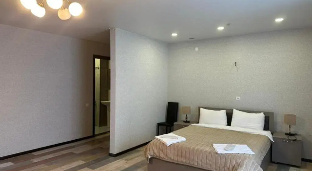 Четырёхместный номер Standard с балконом hotel Qumli