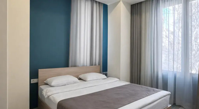 Camera quadrupla familiare Standard con vista sul cortile Amiryan by Armani hotels collection