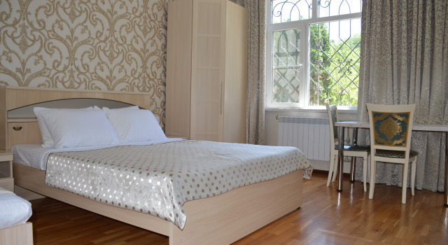 Четырёхместный номер Comfort с красивым видом из окна Гостевой дом Лотос