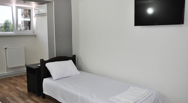 Кровать в общем номере MEDELEAN HOTEL