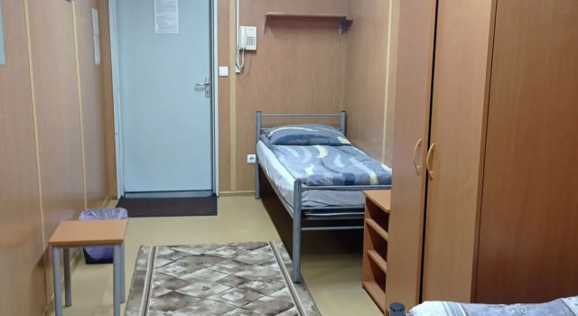 Кровать в общем номере Гостиница Нева