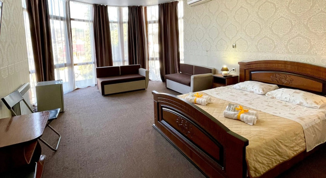 Четырёхместный номер Comfort с видом на море Меблированные комнаты Дом Солнца