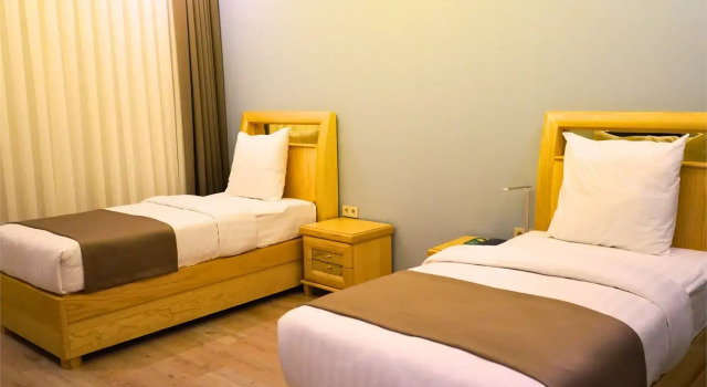 Четырёхместный семейный люкс Отель Al Anvar Hotel