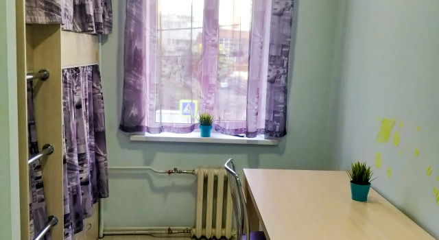 Кровать в общем номере (мужской номер) с видом на город Телеграф
