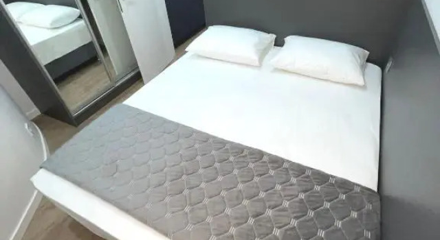 Апартаменты Comfort с 2 комнатами с балконом и рядом с пляжем Апартаменты Leont