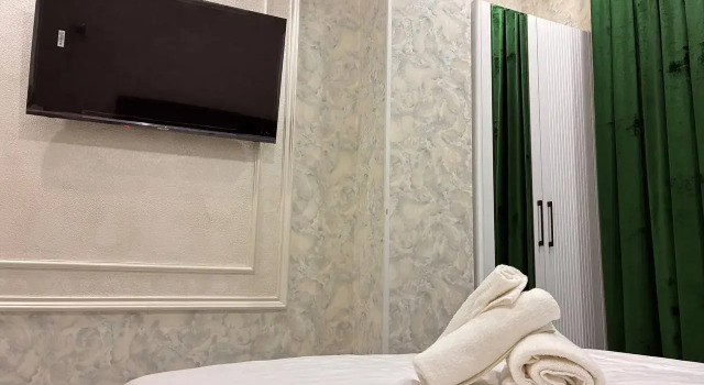 Suite 1 dormitorio con vista a la ciudad DONISH Hotel