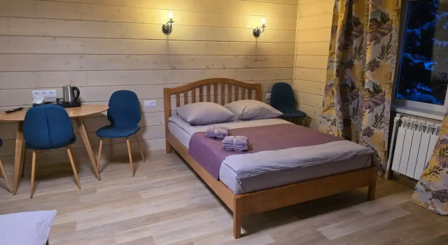 Четырёхместный номер Comfort с красивым видом из окна Гостевой дом Удачный