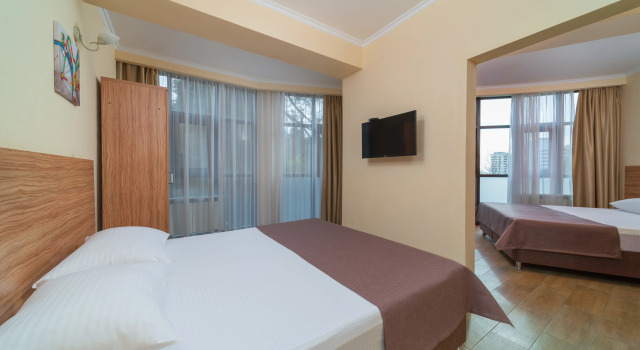 Четырёхместный номер Семейный Отель RoomHotel