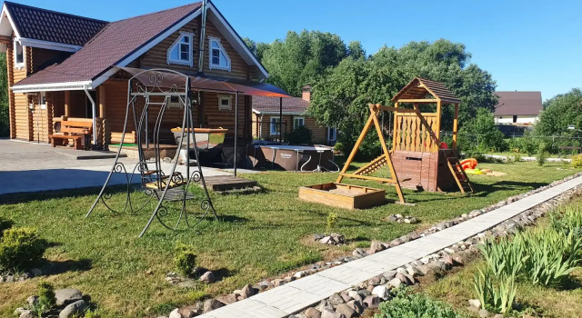 Коттедж с балконом Гостевой дом  с русской баней в Дудкино