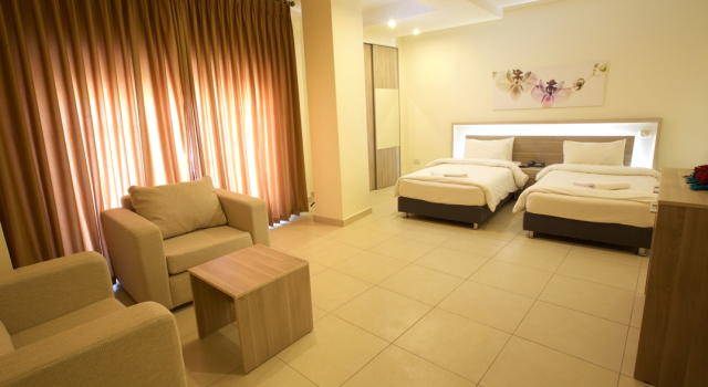Отель Lujain Suites