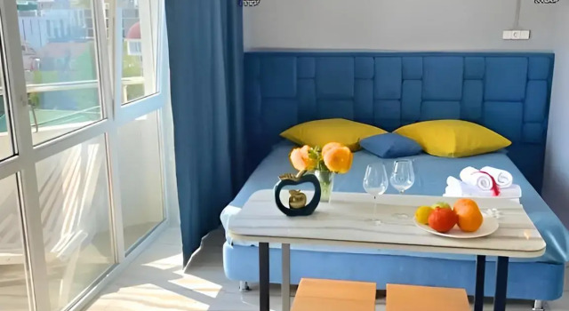 Трёхместный номер Deluxe с балконом и с красивым видом из окна Апартаменты Рай с террасой