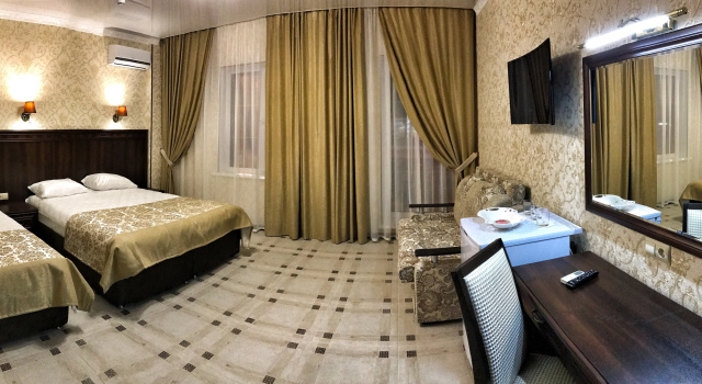 Четырёхместный номер Comfort с красивым видом из окна Гостевой Дом Миг