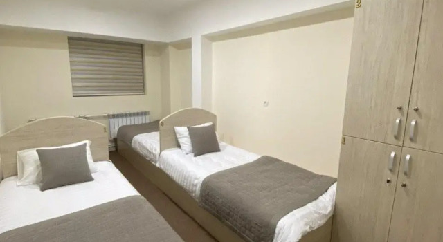 Кровать в общем номере Paradise inn