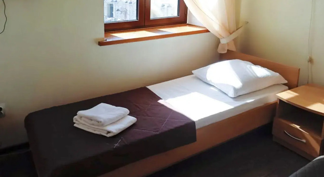 Кровать в общем номере Отель Smart Hotel Владивосток