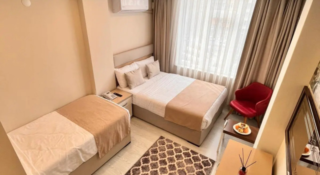 Трёхместный номер Standard с видом на море Отель ŞİMAL HOTEL