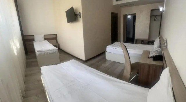 Standard triple chambre Astra Hotel