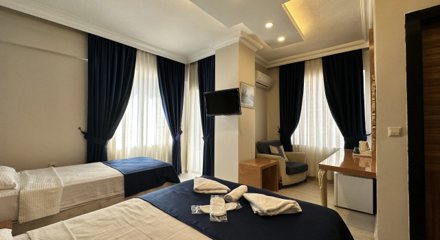 Трёхместный номер Superior с балконом и с красивым видом из окна serenity suit family otel konyaaltı