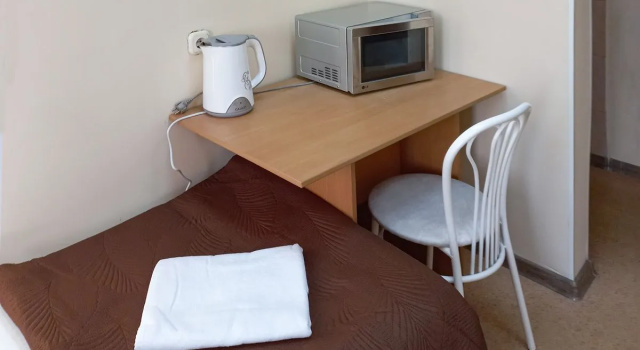 Кровать в общем номере Отель Smart Hotel Биробиджан