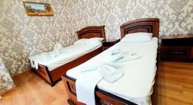 Трёхместный номер с балконом и рядом с пляжем Курортный Гостевой Дом Лооленд