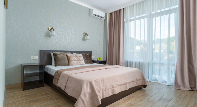 Четырёхместный номер Deluxe с балконом и с видом на горы Гостевой дом Helas