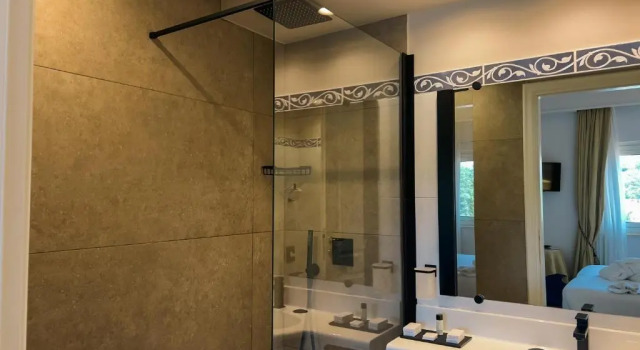 Triple Suite with balcony and with partial sea view Altafiumara Resort & Spa