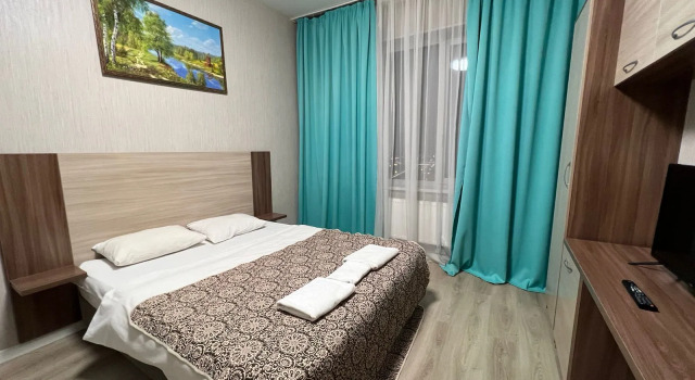 Семейные апартаменты с балконом и с красивым видом из окна Апартаменты Neon Apart House