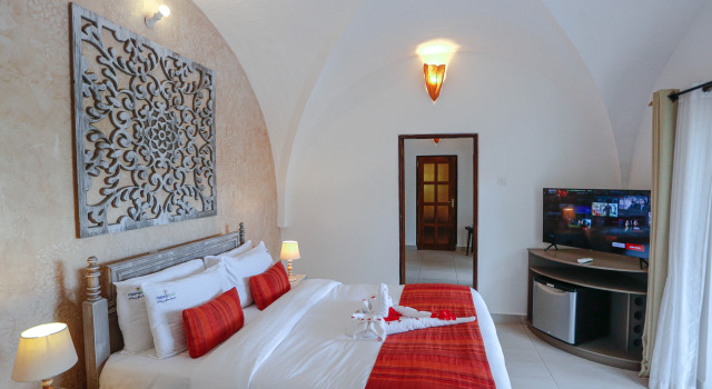 Вилла с 3 комнатами Отель Mzima Beach Resort