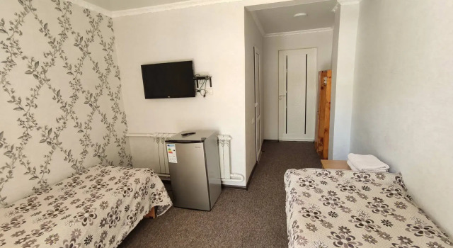 Четырёхместный номер Comfort с балконом и с красивым видом из окна Hotel Natalia