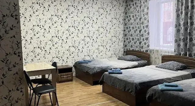 Кровать в общем номере Гостевой дом ТвойОтель