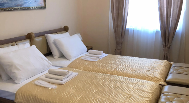 Camera quadrupla Deluxe No.2 2 camere Delfin Hotel	