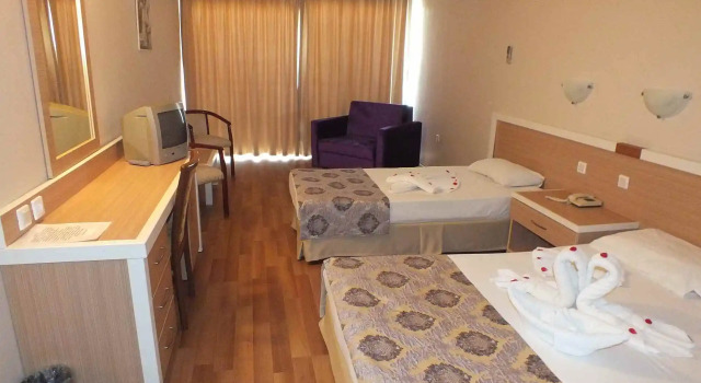 Четырёхместный номер Economy Tuntas Beach Hotel - All Inclusive