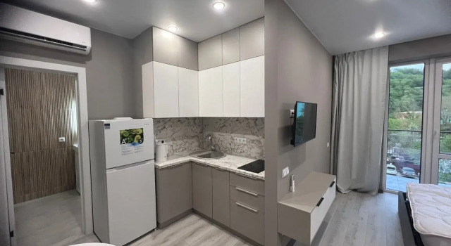 Двухместные апартаменты с балконом Uyutnye V Dagomyse Apartments