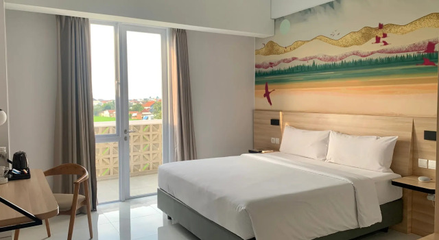Supérieure double chambre avec balcon favehotel Pamanukan