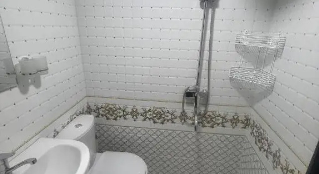 Habitación cuádruple Estándar con balcón RAXMATJON Hotel