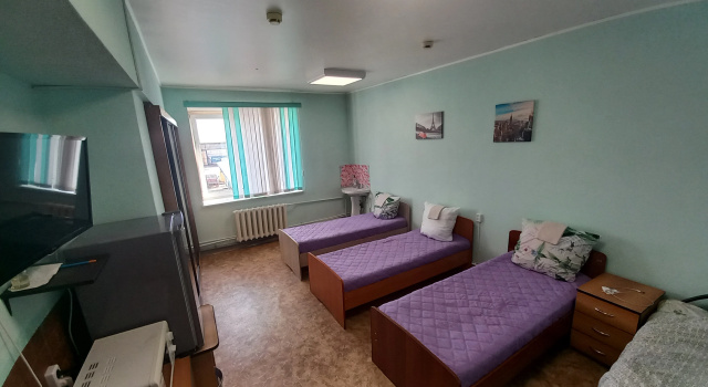 Кровать в общем номере Отель Сатка