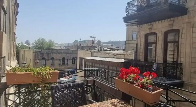Трёхместные апартаменты с балконом и с красивым видом из окна Apartments History 1870