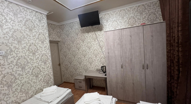 O podwyższonym standardzie trzyosobowy pokój Diyora Hostel